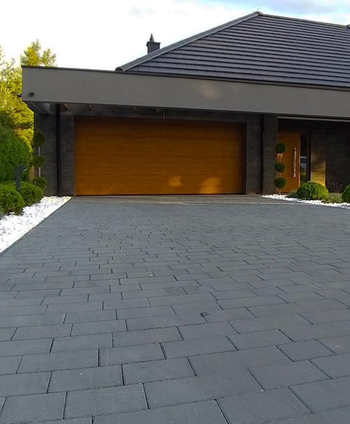 Okrągłe kompozycje ogrodowe z kostki brukowej